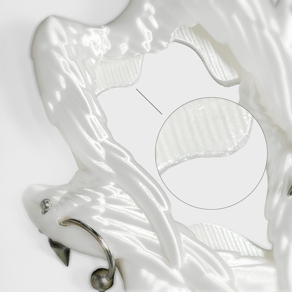 Close-up showing support contact marks on a 3D-printed object